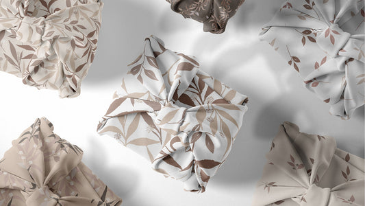Wrapped up gifts in fabric designed by Stacie Mar. Beige and brown floral pattern collection Tranquil Botanica
